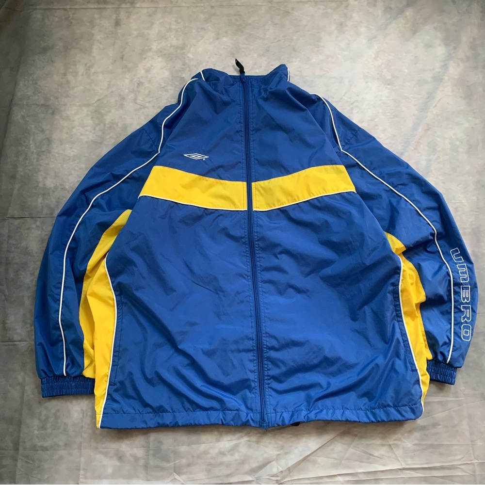 Vintage 90s Umbro blue and yellow windbreaker jacket